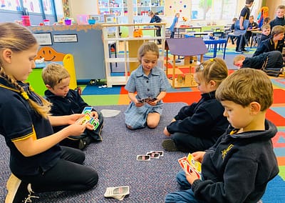 Students playing board games together